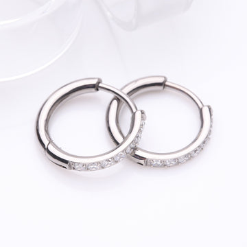 Detail View 1 of A Pair of Implant Grade Titanium Gem Lined Huggie Hoop Earring-Clear Gem